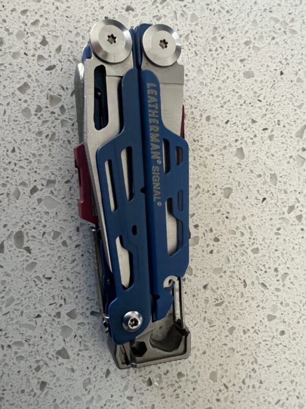 Blue Leatherman Signal in the closed position with the hammer at the bottom